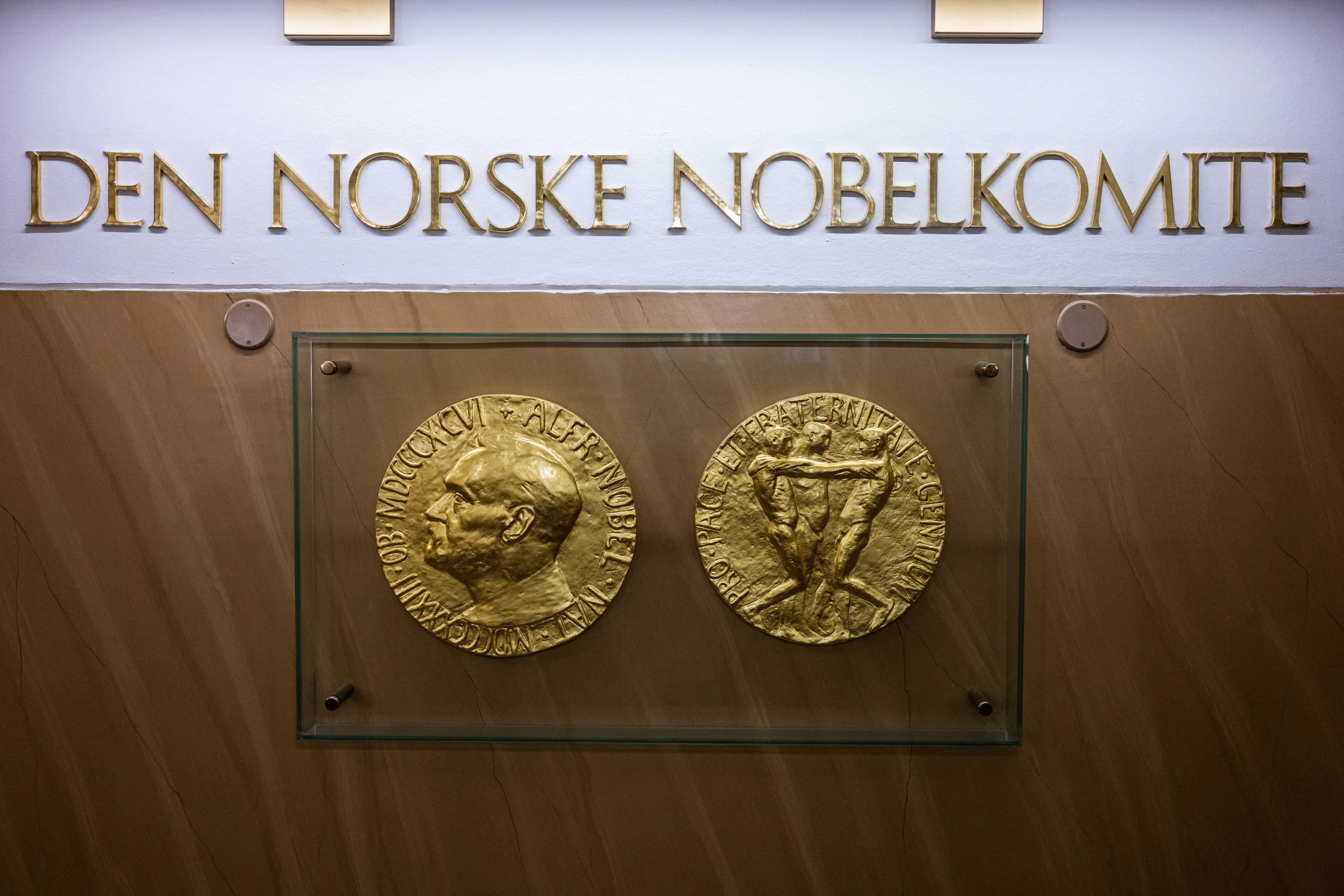 Replicas of the obverse and reverse of the Nobel Peace Prize medal displayed at The Norwegian Nobel Institute in Oslo.